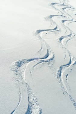 Two ski traces in the snow clipart