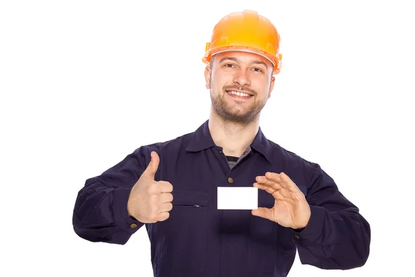 Portret van de bouwer met visitekaartje op een witte achtergrond — Stockfoto