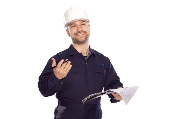 Porträtt av en byggmästare i en vit hjälm på en vit bakgrund — Stockfoto
