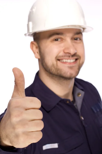 Portret van een bouwer in een witte helm op een witte achtergrond — Stockfoto
