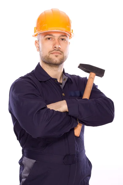 Rasgo de un joven constructor con las herramientas —  Fotos de Stock