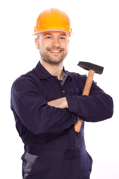Rasgo de un joven constructor con las herramientas —  Fotos de Stock