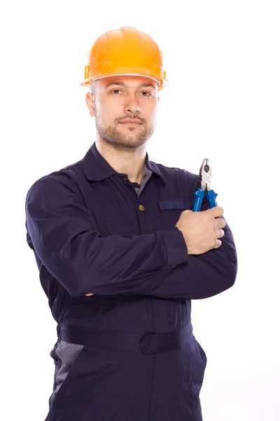 Traço de um jovem construtor com as ferramentas — Fotografia de Stock