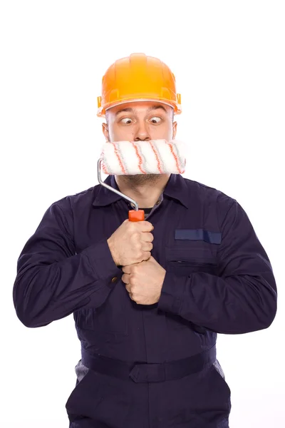 Lustiges Porträt eines Bauunternehmers auf weißem Hintergrund — Stockfoto