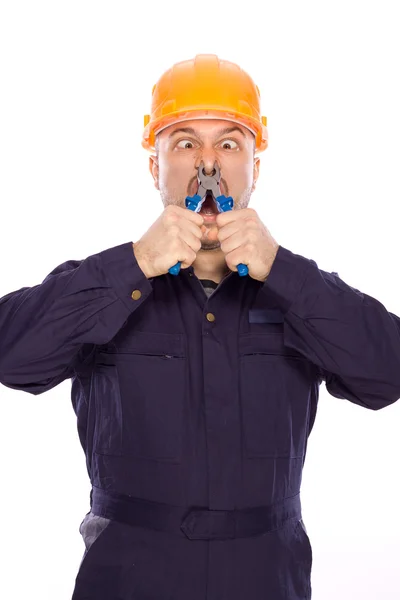 A builder, egy fehér háttér vicces portréja — Stock Fotó