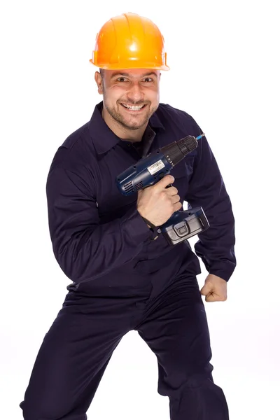 Portrait of a builder with a drill in his hands on a white background — Stock Photo, Image