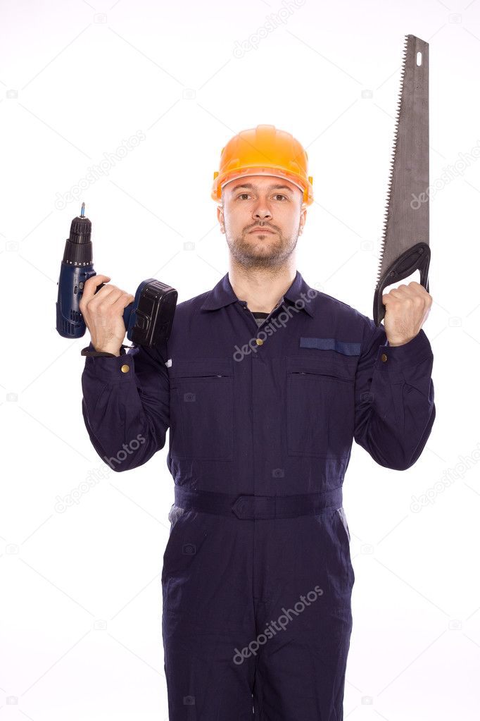 Portrait of a builder with a drill and a saw in his hands on a white background