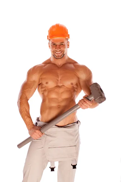 Junge und gutaussehende Bauunternehmerin mit Vorschlaghammer und sexy Körper — Stockfoto