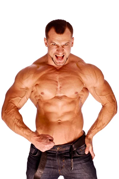 Muscular fisiculturista masculino no fundo branco — Fotografia de Stock