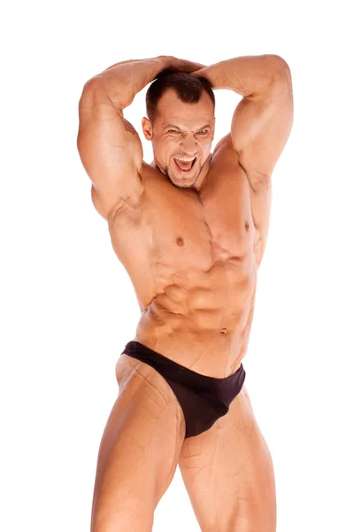 Gespierde mannelijke bodybuilder op witte achtergrond — Stockfoto