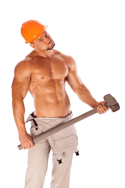 Schöner Bauunternehmer mit Vorschlaghammer und sexy Körper — Stockfoto
