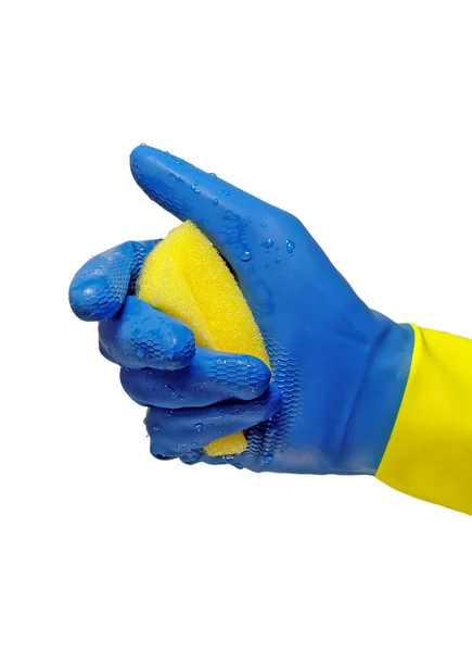 Mão usando uma luva de trabalho e uma esponja — Fotografia de Stock