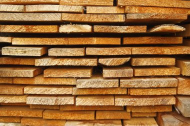 Close up view of old stacked wooden boards clipart