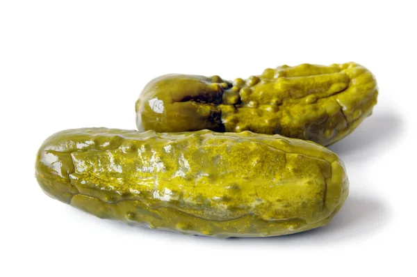 Two pickled cucumbers. Gherkins. Isolated on white. — Stock Photo, Image