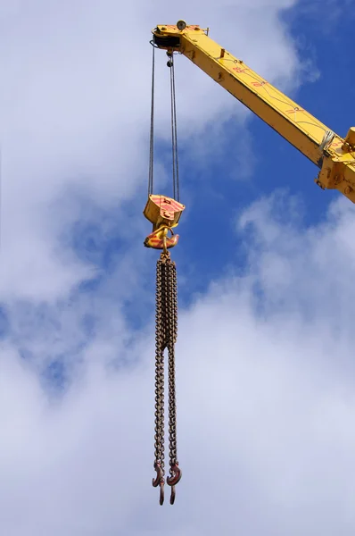 Stock image Metal crane on a blue sky