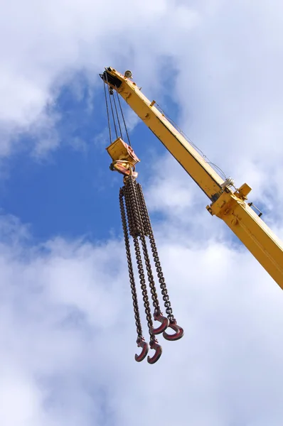 Metal crane on a blue sky — Stock Photo, Image