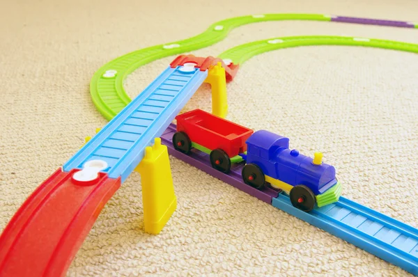 stock image The children's plastic colour railway and train