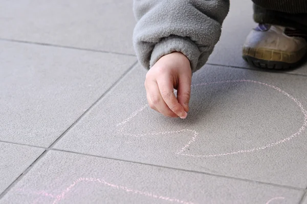 stock image Girl drawing with chalk