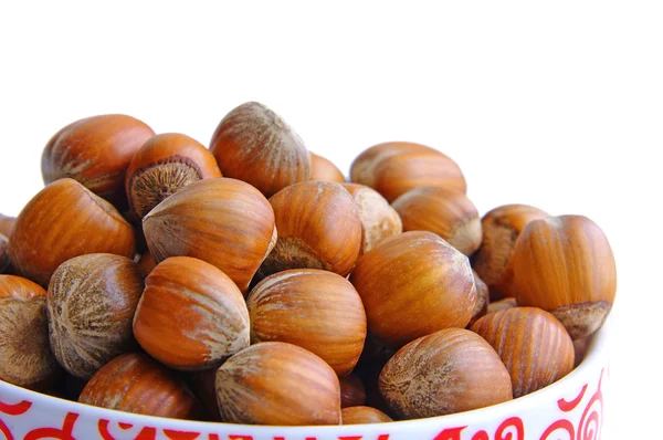 Mísa plná lískových ořechů — Stock fotografie