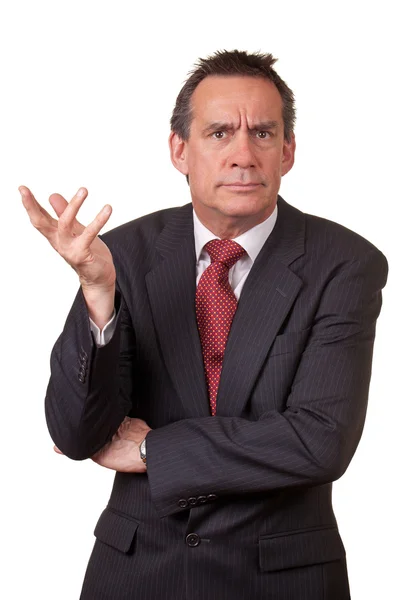 Homem de negócios irritado no terno levantando a mão em irritação — Fotografia de Stock