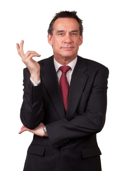 Ο άνθρωπος των επιχειρήσεων στο κοστούμι χειρονομίες με χέρι — Φωτογραφία Αρχείου