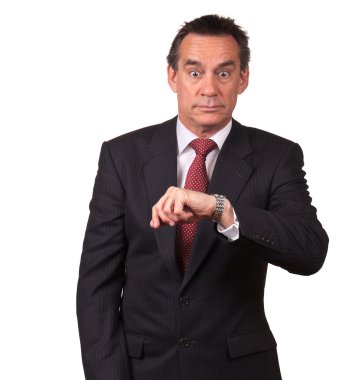 Business Man in Suit Surprised at Time on Watch clipart