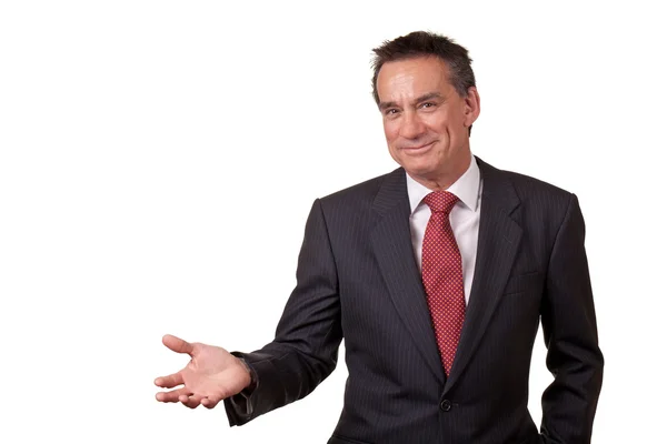 Усміхнений бізнес чоловік жестикулює з відкритою рукою — стокове фото