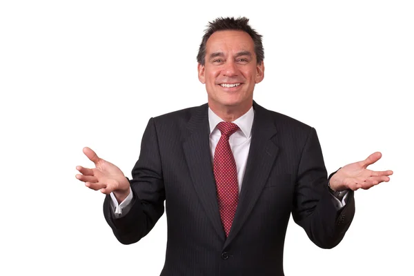 Uśmiechnięty człowiek biznesu w kolorze gestykulacji z otwartej ręce — Zdjęcie stockowe