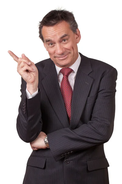 Smiling Business Man in Suit Pointing Left — Stock Photo, Image