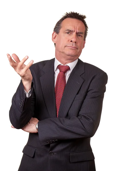 Homem de negócios de terno com expressão irritada — Fotografia de Stock