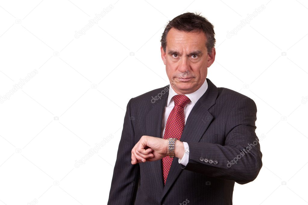 Business Man in Suit Looking at Time on Watch