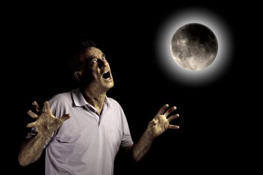 Scary Man Turning into Werewolf or Beast Under a Glowing Full Moon clipart