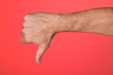 Thumbs Down Sign on Red Background clipart