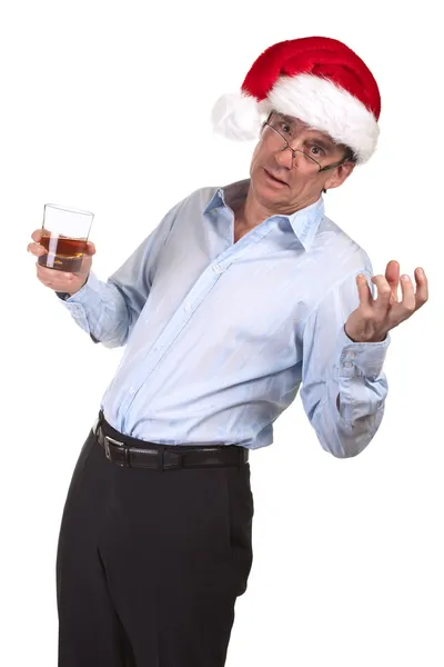 Noel Baba şapkası elinde içki sarhoş iş adamı — Stok fotoğraf