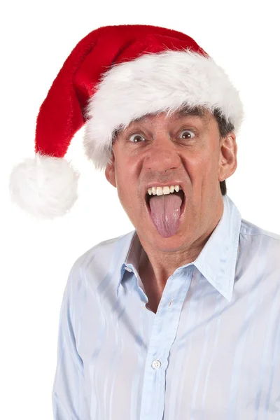 Hombre de negocios en Santa Sombrero sobresaliendo de la lengua — Foto de Stock