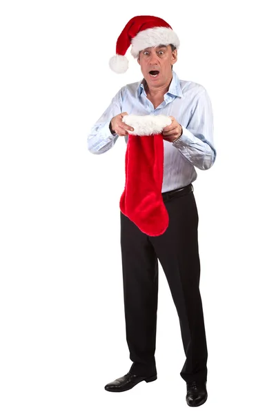 Business Man in Santa Hat shocked at contents of Christmas Stocking — Stock Photo, Image