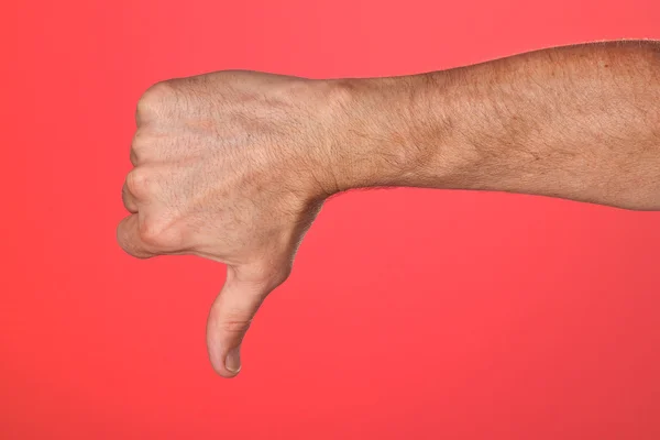 Thumbs Down Sign on Red Background — Stock Photo, Image