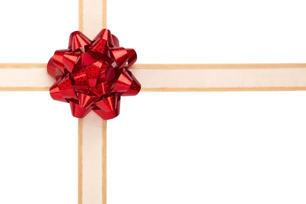 Gift Wrap with Gold Ribbon and Red Shiny Bow — Stock Photo, Image