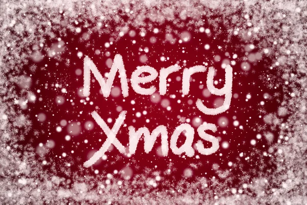 Christmas Red Background with Merry Xmas Text in Snow Writing — Stock Photo, Image