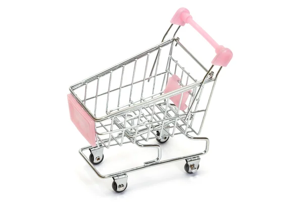 Pink shopping cart on white — Stock Photo, Image