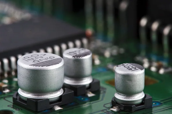 Capacitors on circuit board — Stock Photo, Image