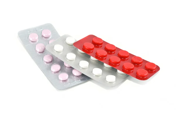 Diferentes pastillas en ampollas, aisladas —  Fotos de Stock