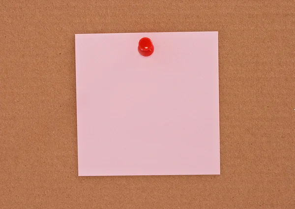 stock image Pink note paper attached with red pin