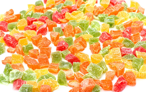 Sweet candied fruits as background