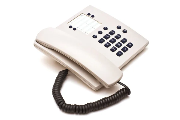 โทรศัพท์พลาสติกสีเทาบนพื้นหลังสีขาว — ภาพถ่ายสต็อก