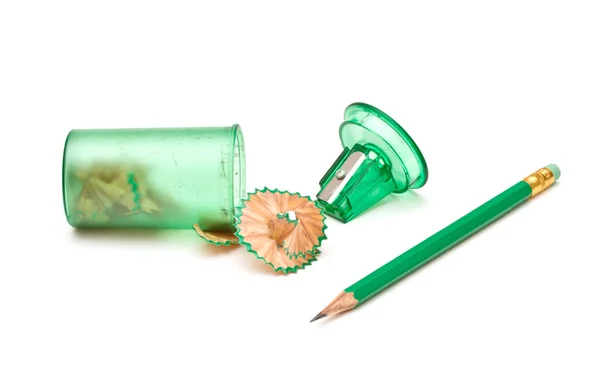Green sharpener and pencil on white background. — Stock Photo, Image