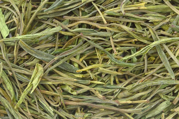 Китайский зеленый чай в качестве фона — стоковое фото