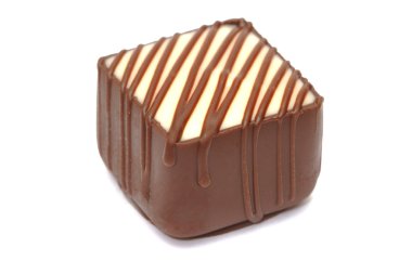 Chocolate praline on white background clipart