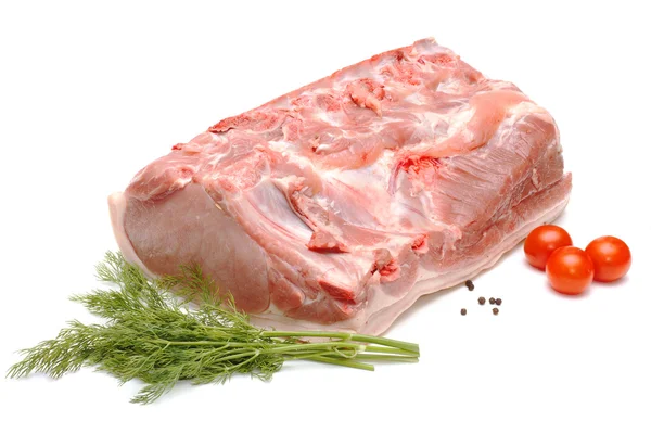 Кусок свинины и овощей на белом — стоковое фото