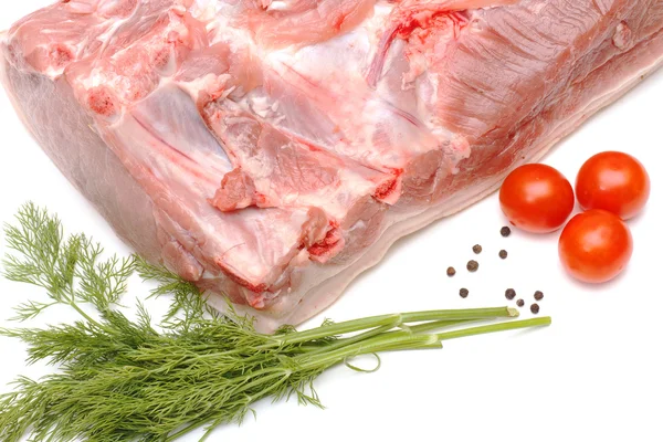 stock image Piece of pork and vegetables on white